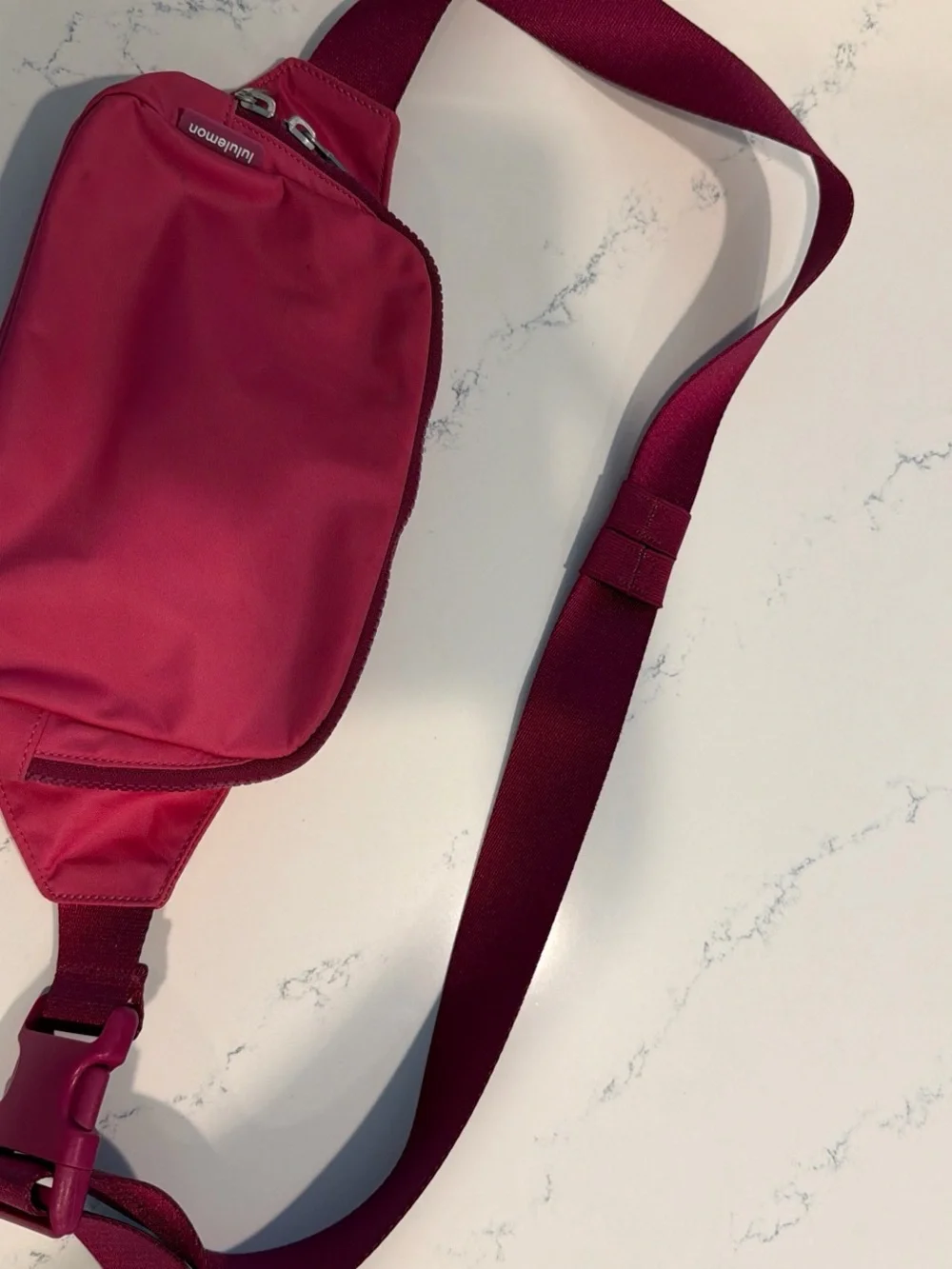 Pink Lululemon belt bag
